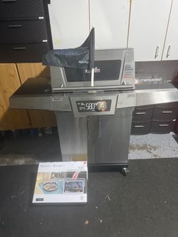 Brand new never used BBQ grill and 16inch waterproof TV