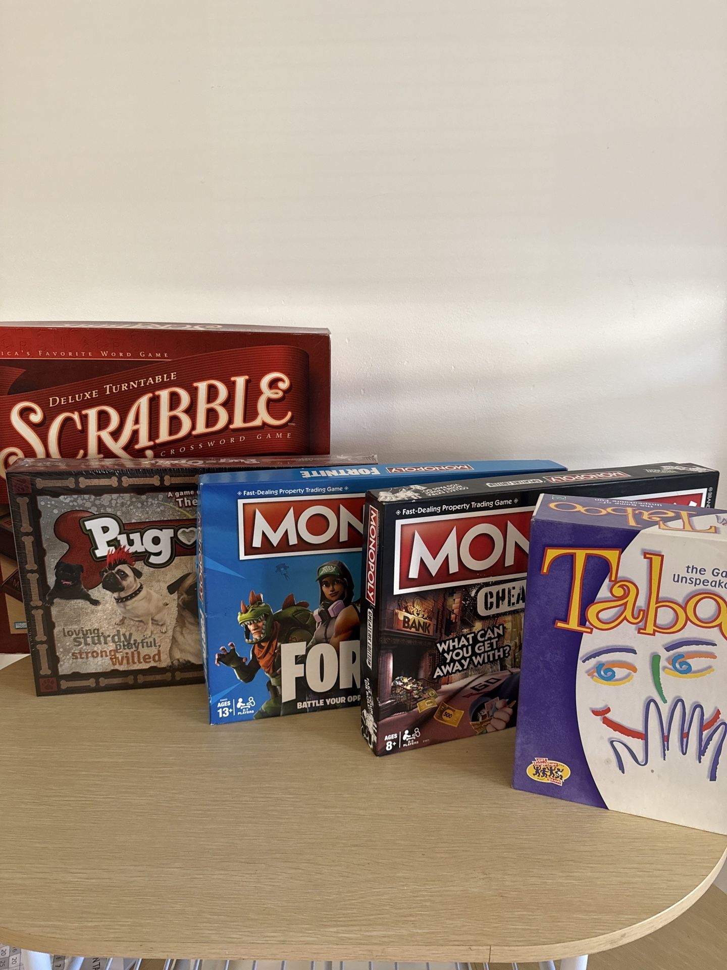 Family & Party Board Game Bundle – Monopoly, Scrabble, Taboo, Pugopoly (Buy 1 or All 5)