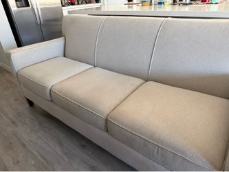 Light gray/white couch or sofa
