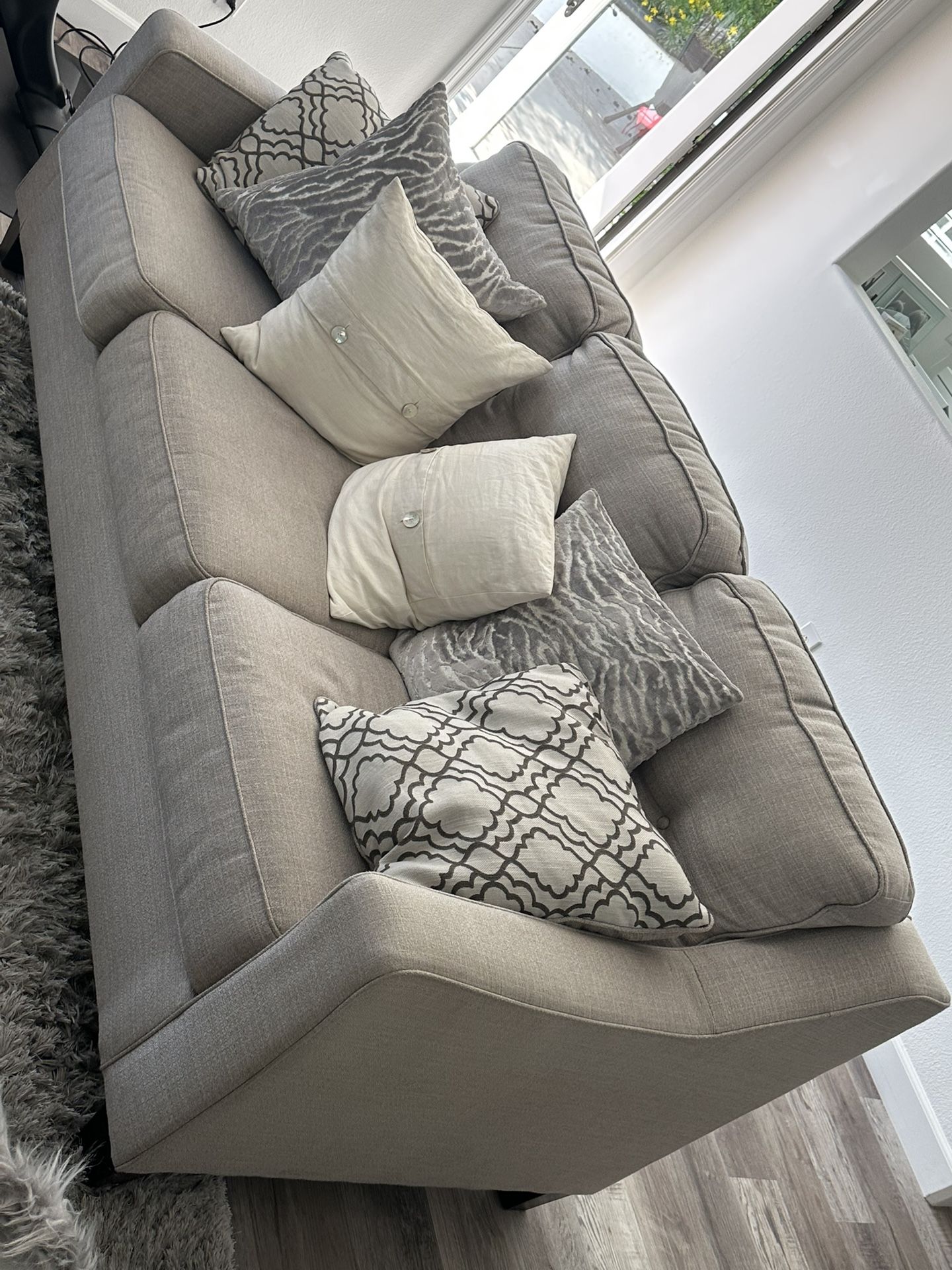 Matching sleeper sofa, oversize chair, and ottoman excellent condition
