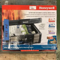  (Used Good) Honeywell 0.24 cu. ft. Molded Fire Resistant and Waterproof Portable Chest with Carry Handle, Key and Double Latch Lock