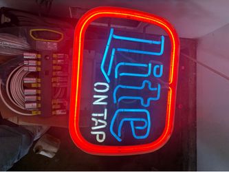 Neon lights, Budweiser and Miller