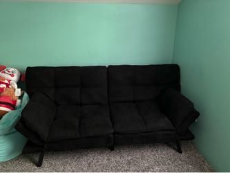 2 identical black futons