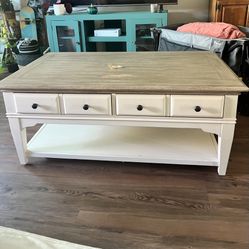 Living Spaces “Kira” Coffee Table — Solid Wood, 2 Drawers