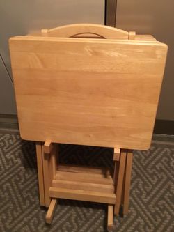 5 Pc. Set Oak TV Trays     Only one of trays shows wear.       Excellent Condition.      $50