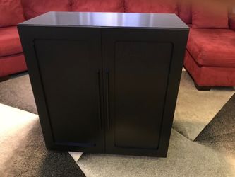 New storage cabinet with soft close doors.