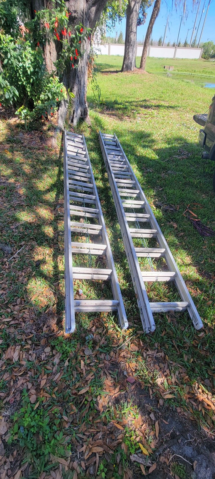 two ladders, one of 32 feet and one of 28 feet