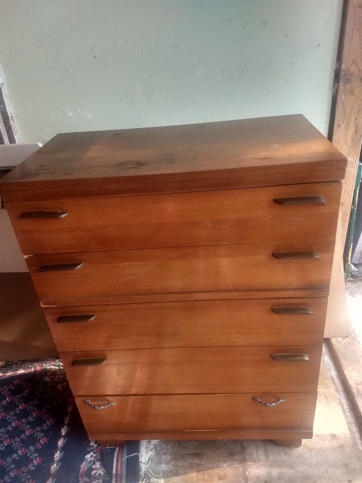 Handsome solid pecan wood five drawer dresser.