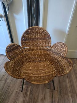 woven rattan and wicker flower accent chair