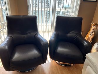 MUST GO TODAY Chocolate Brown leather swivel chairs on chrome bases. H39" W31"