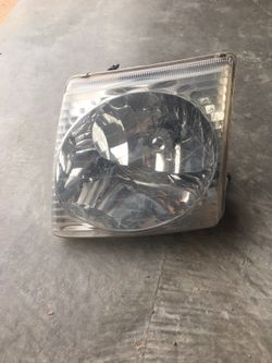 2001-05 Explorer Sport track LH Driver head light