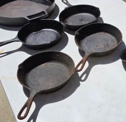 Collection of four skillets