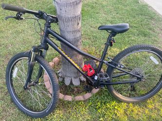 Black Specialized Mountain Bike with Renegade Tires
