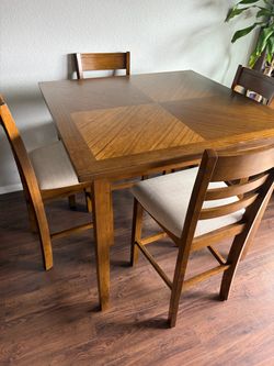 Living spaces dining table and chairs