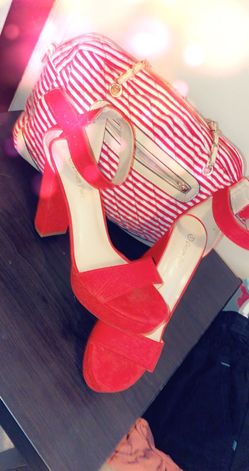 Red thick heels and matching purse