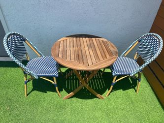 Wooden 3-piece bistro set includes a round folding table and two Safavieh chairs.