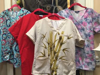Scrub tops size medium $5 Each