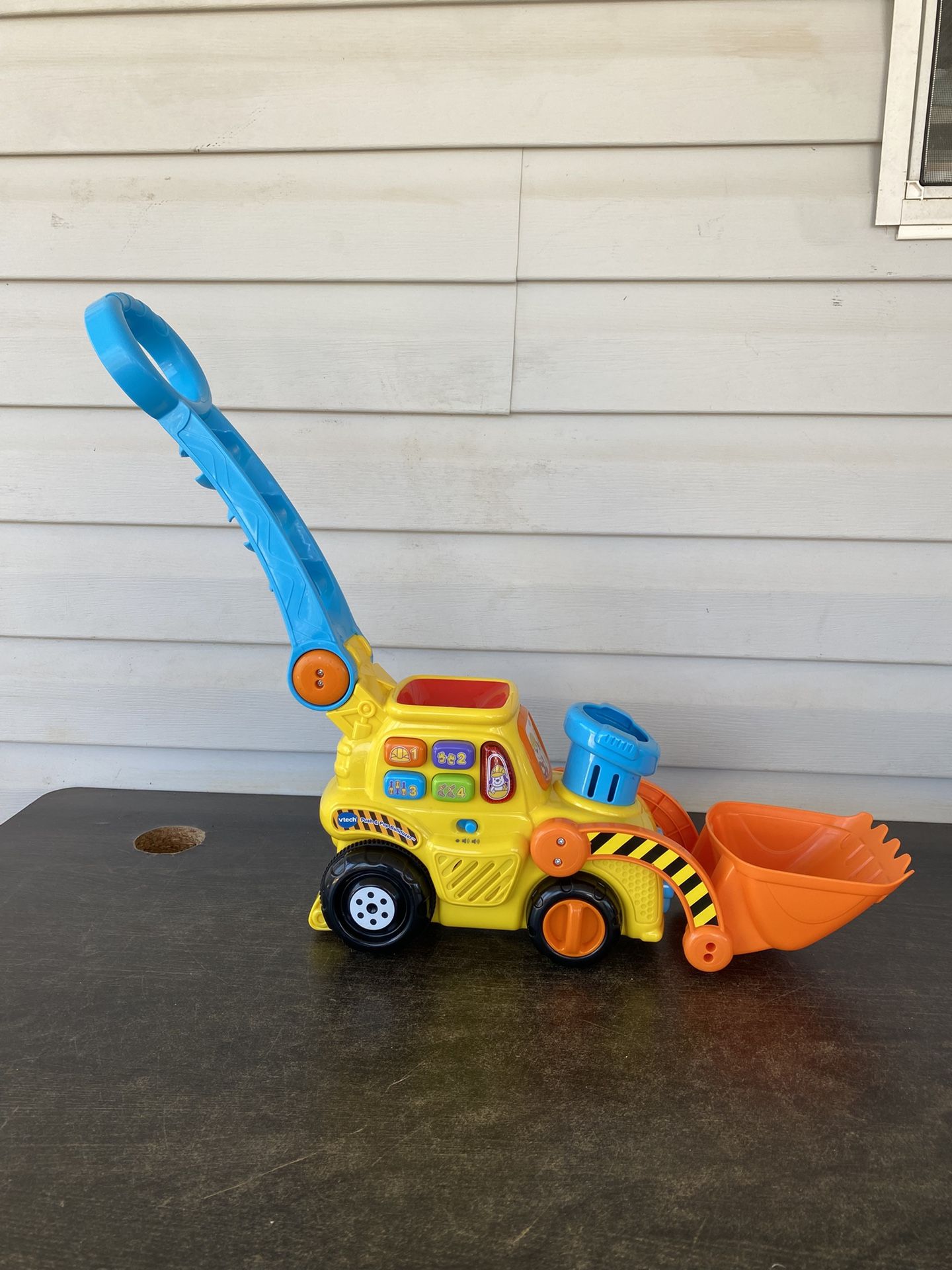 Vtech push and pop bulldozer