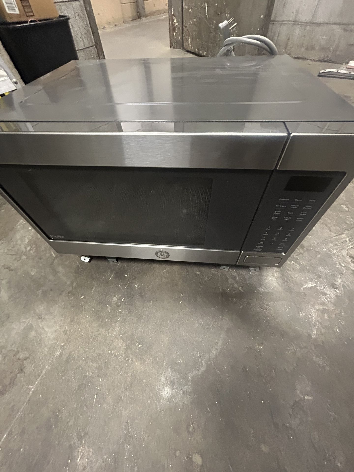 GE Profile 24" Countertop Microwave, 2.2 cu. ft. Capacity, 1100 W in Stainless Steel. Pick Up Only .