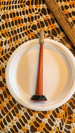 Vintage orange and black Halloween tin horn