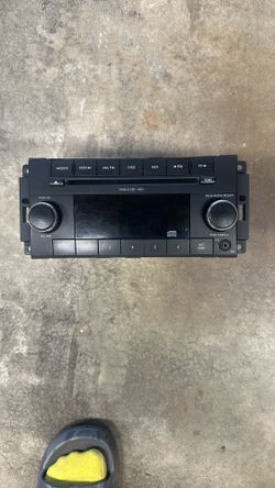 Jeep Wrangler OEM Head unit, W/ Mounting Bracket