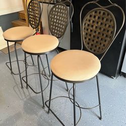 Wrought iron swivel barstools $75 each