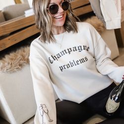 Unisex Size M "Champagne Problems" Crewneck Sweatshirt, Black on Cream, NEW