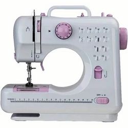 white and purple sewing machine