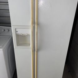 White GE Refrigerator And Freezer
