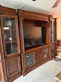 Dark wood multi piece entertainment set with cabinets