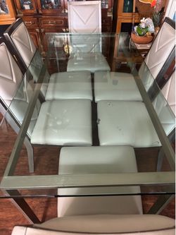 Glass table and 6 chairs