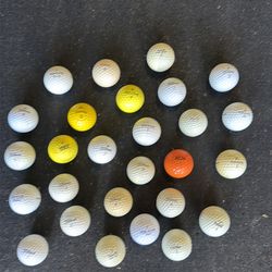Lot of 27 vintage golf balls