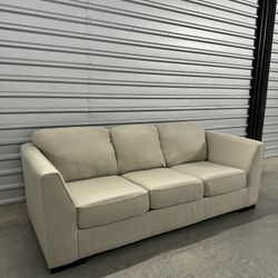 Beige Ashley Furniture Sofa