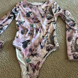 woman long sleeve body suit cute size medium 