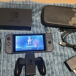 NINTENDO SWITCH WITH EVEE EVOLUTION, 256GIG MEMORY CARD, DOCKING STATION AND CASE 