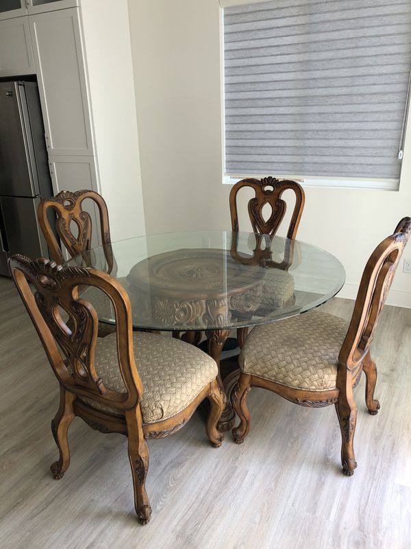 Like New Glass Round Classic Dining Table with 4 Chairs for Sale in
