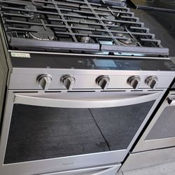 Slide-in Stainless Gas Five Burners Everything Works 
