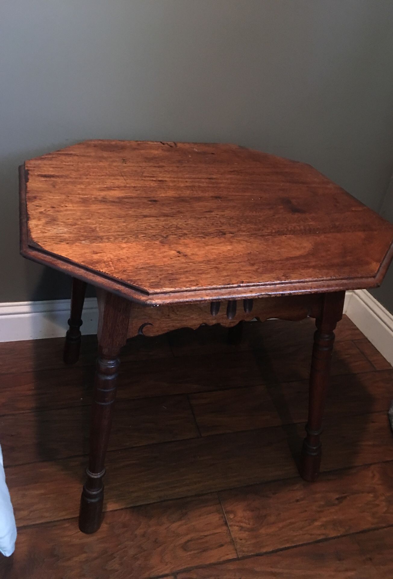 Antique beside table .