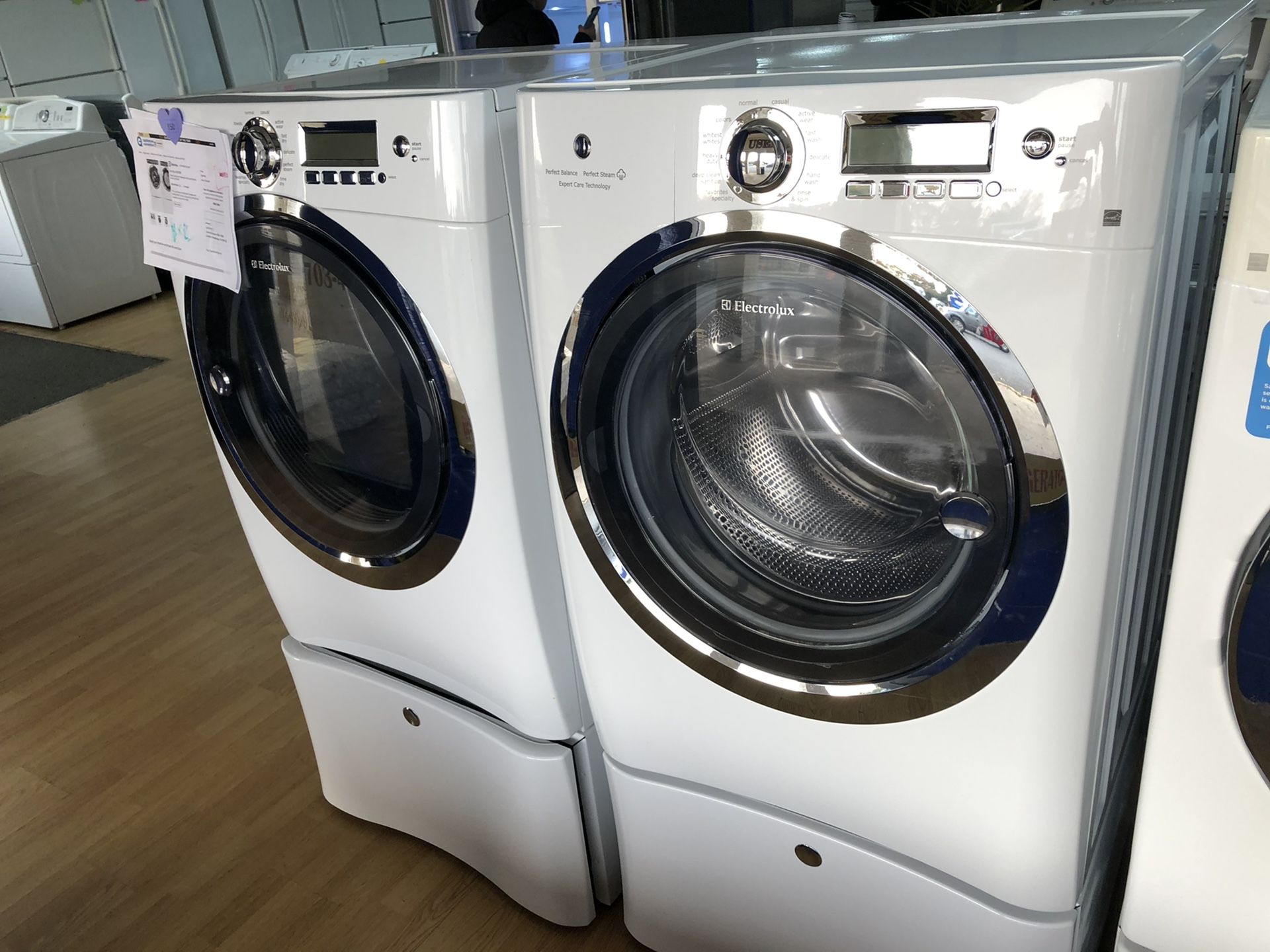 Electrolux white washer and dryer set with pedestals