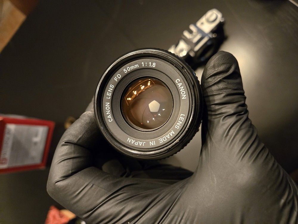 Canon AE1/AT Bodies And FD Lens