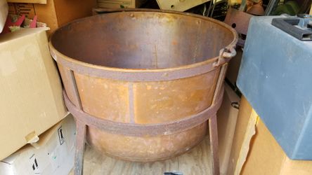 Copper apple butter tub with stand and paddle. 50 gallon