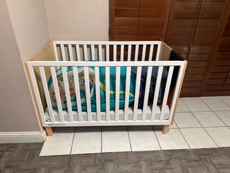 White and Natural Wood Baby Crib