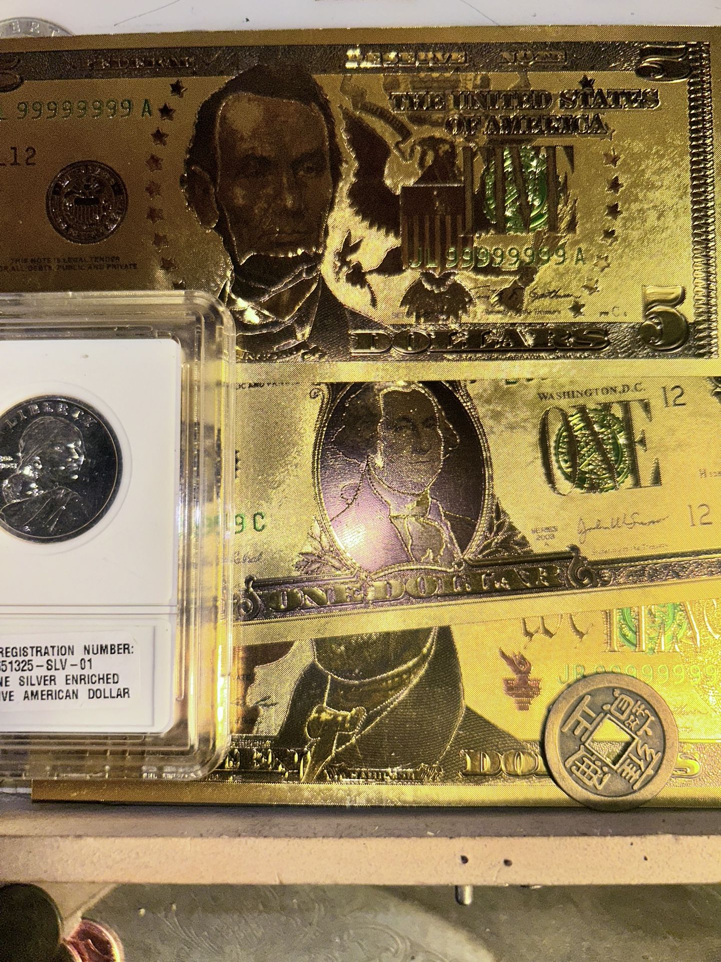 Three individual different domination, gold bank notes with one old Chinese
