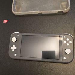 Grey Nintendo Switch Lite + Case $120