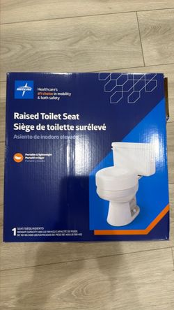 Raised toilet seat