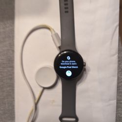 Google Pixel Watch and charging Cord