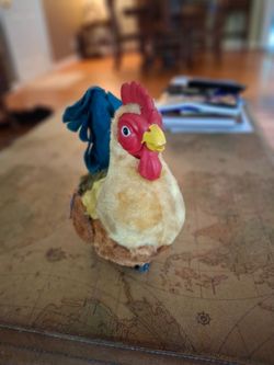 Vintage battery operated plush rooster toy.