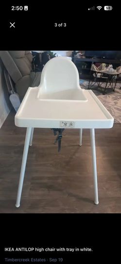 IKEA ANTILOP high chair with tray in white.