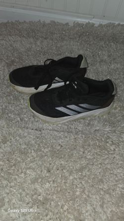 2 pairs of  tennis shoes