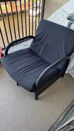 Chair bed with a metal frame